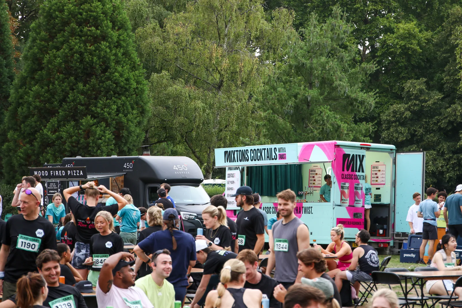 Runners gathered around the food and drink trucks after the race